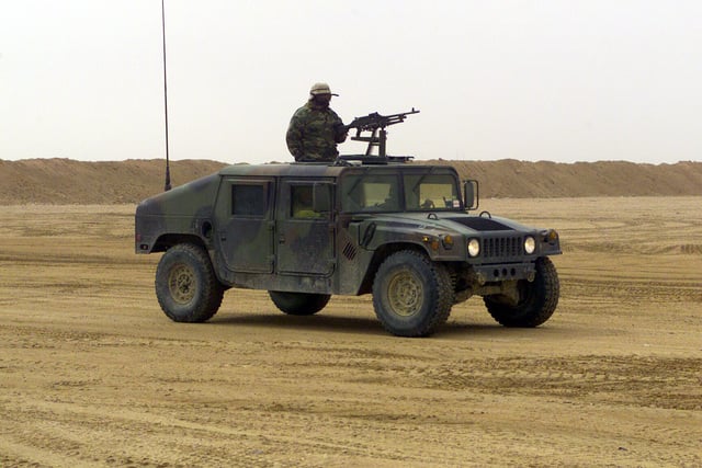 US Marine Corps (USMC) Marines provide security at an ammunition ...