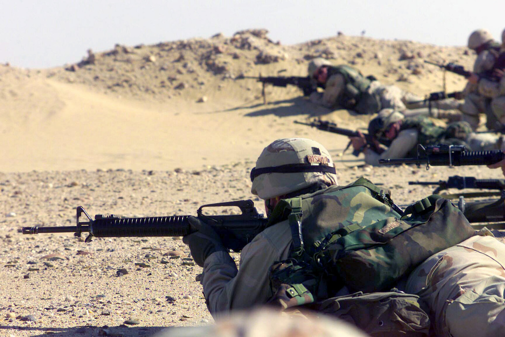 Armed with Colt 5.56 mm M16A2 rifles, US Marine Corps (USMC