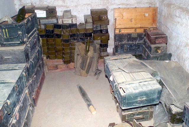 An Iraqi workspace and stockpile of rocket propelled grenades and ...