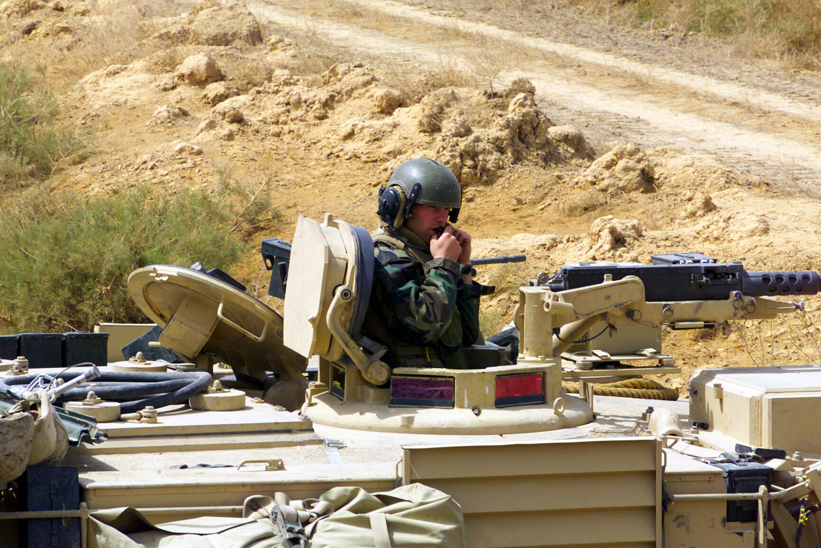 A US Marine Corps (USMC) Marine Mans A M2HB .50 Caliber Machine Gun ...