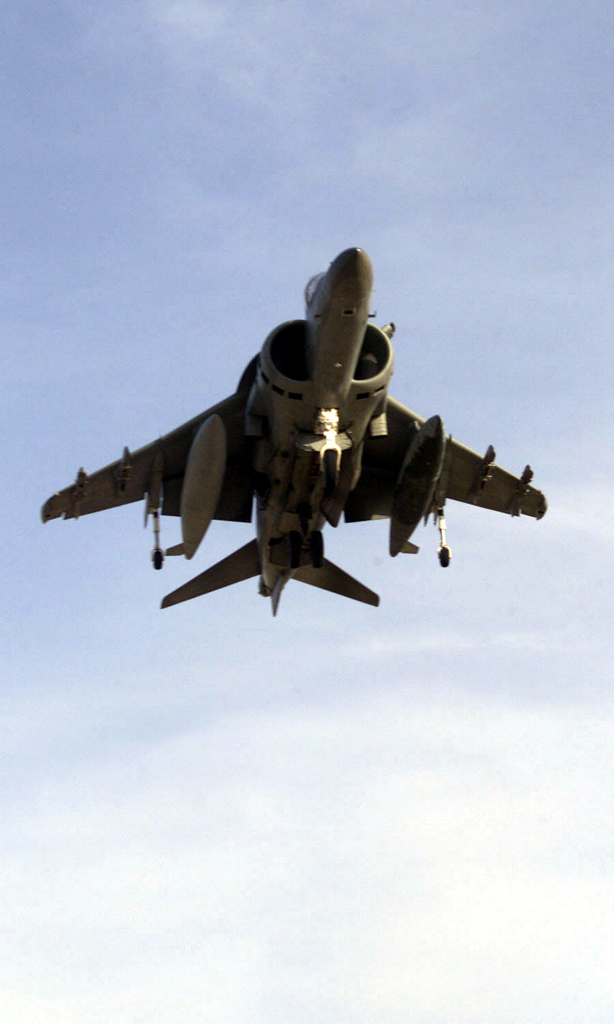 A US Marine Corps (USMC) AV-8B Harrier strike aircraft lands at a ...