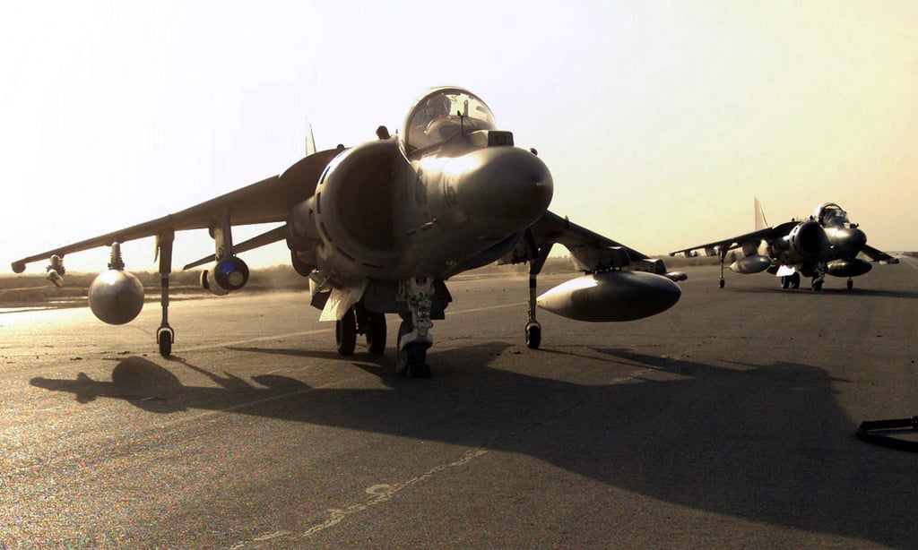 A US Marine Corps (USMC) AV-8B Harrier Strike Aircraft Wait To Take Off ...