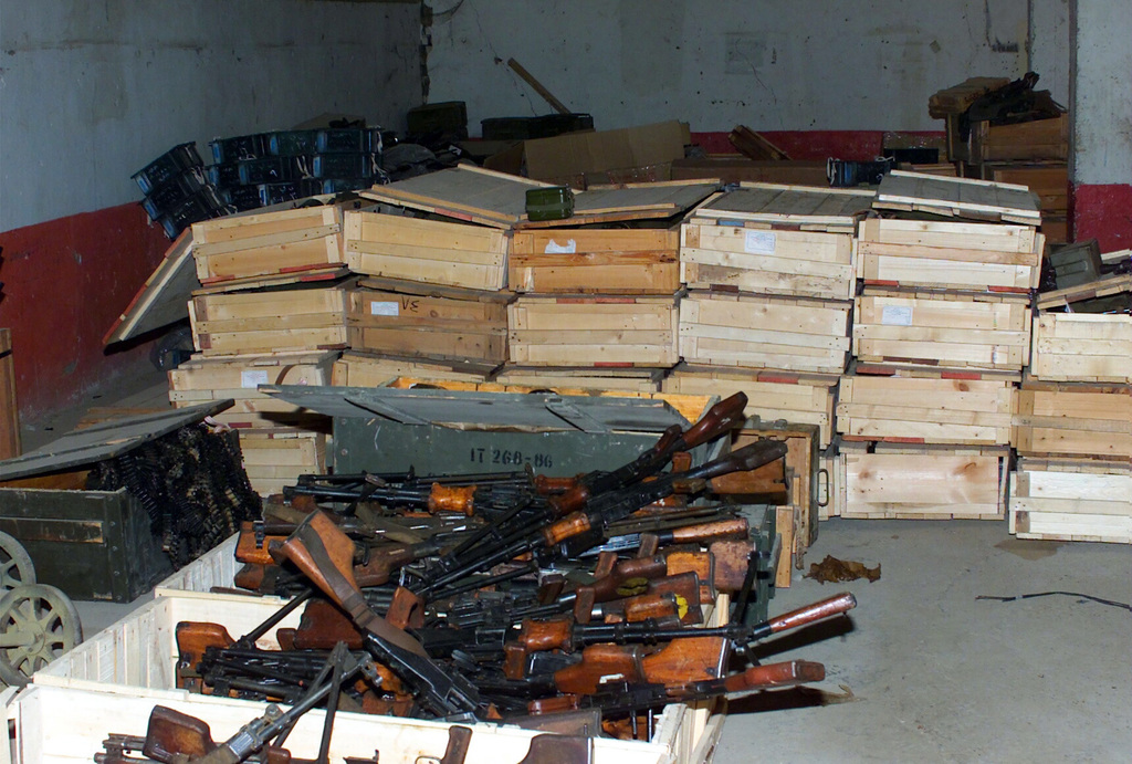 A captured Fedayeen weapons cache of Russian RPK 74 rifles, ammunition ...