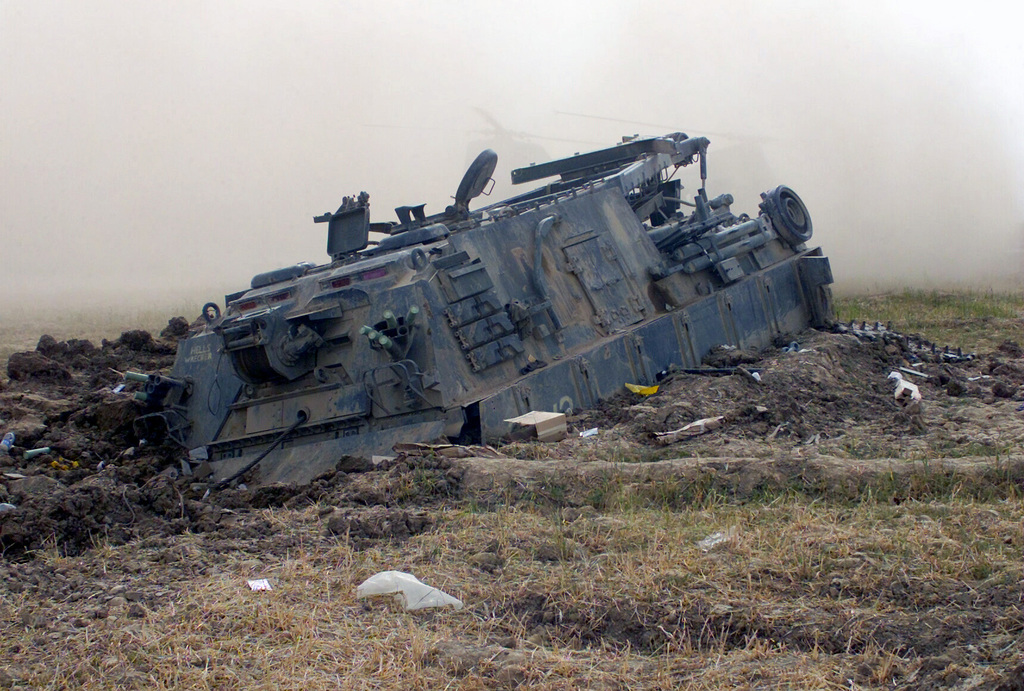 The destroyed remains of a US Marine Corps (USMC) M1-88 Vehicle Tank ...