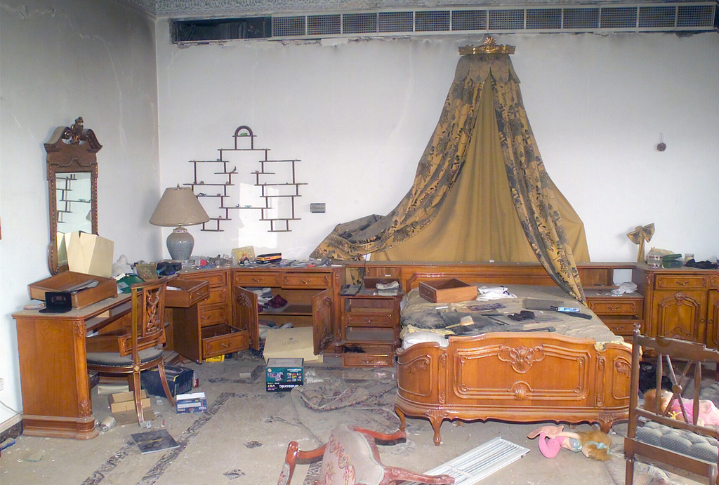 An Ornate Bed And Antique Bedroom Furniture In One Of Saddam