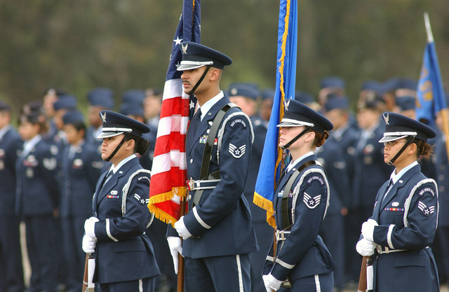 The US Air Force (USAF) 30th Space Wing (SW) Base Honor Guard stand at ...