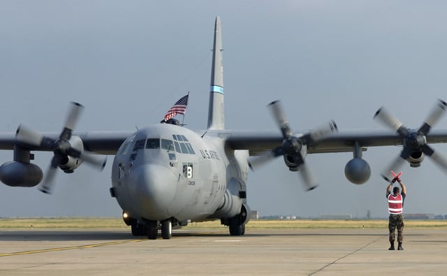 A US Air Force (USAF) C-130 Hercules aircraft Crew CHIEF assigned to ...