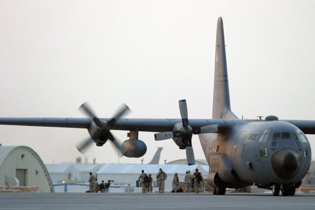 Passengers depart a US Air Force (USAF) C-130H, 139th Airlift Wing (AW ...