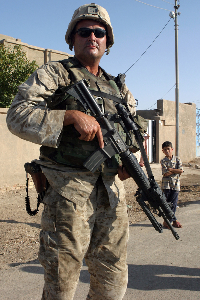 A Marine stands guard near the site of the Marine Battalion