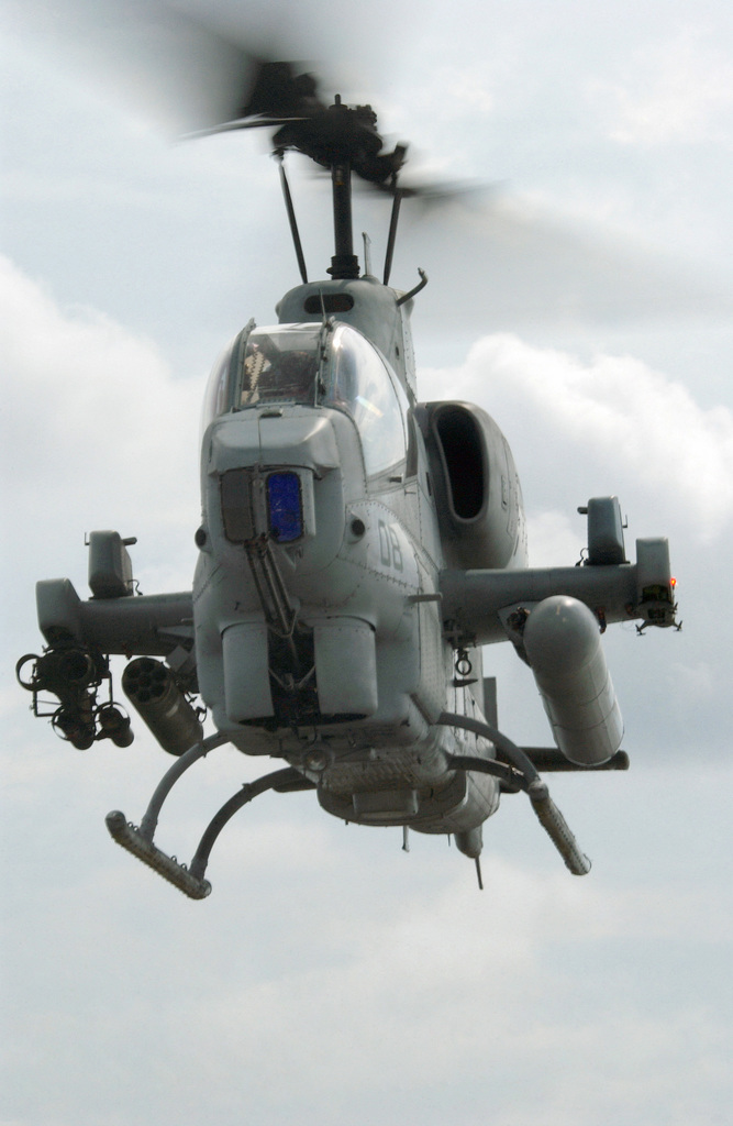 A US Marine Corps (USMC) AH-1W Super Cobra from Helicopter Marine Light ...