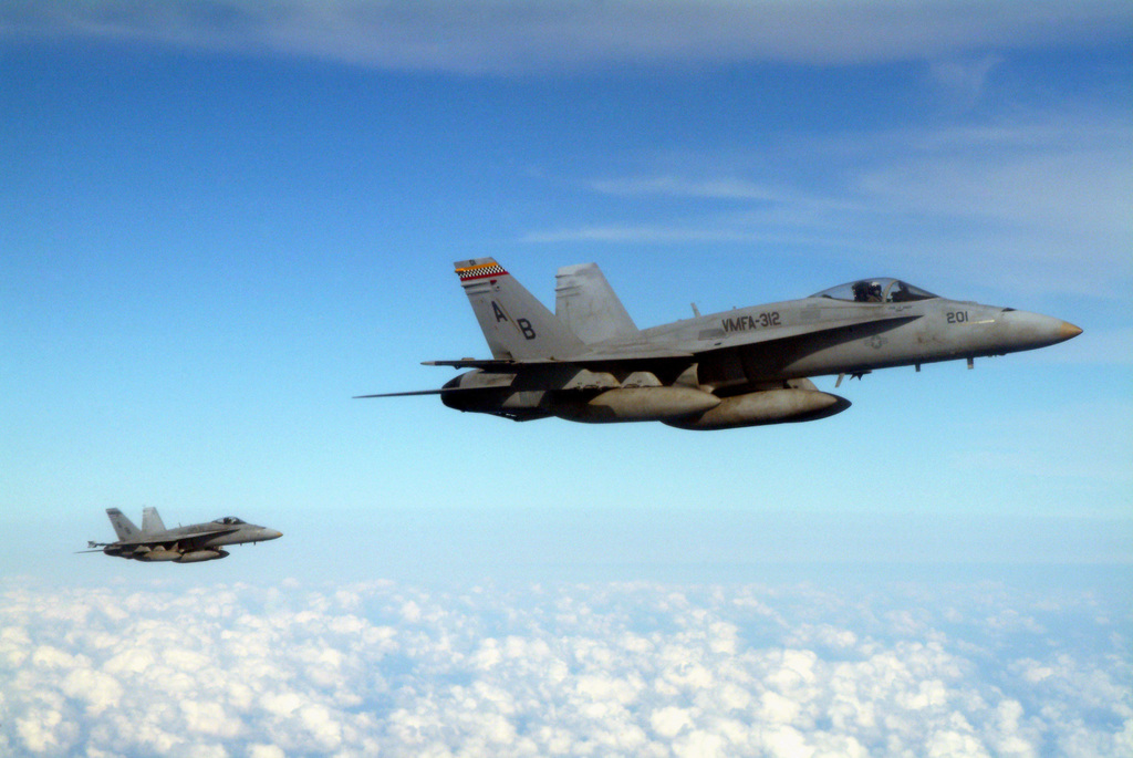 Two Us Marine Corps (usmc) F A-18c Hornet Aircraft Assigned To Marine 