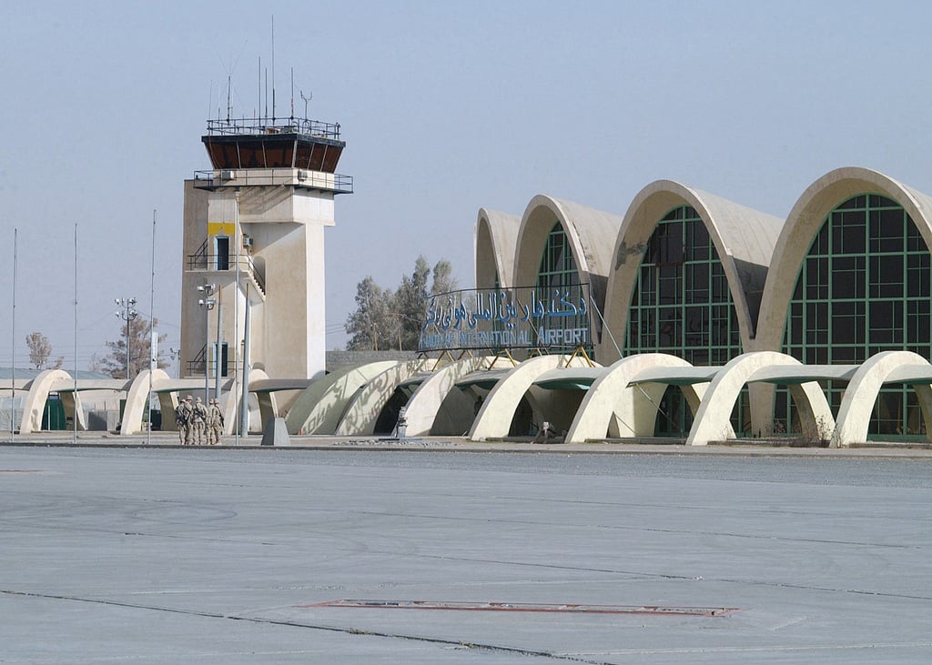 A view of the air traffic control tower and passenger terminal of ...