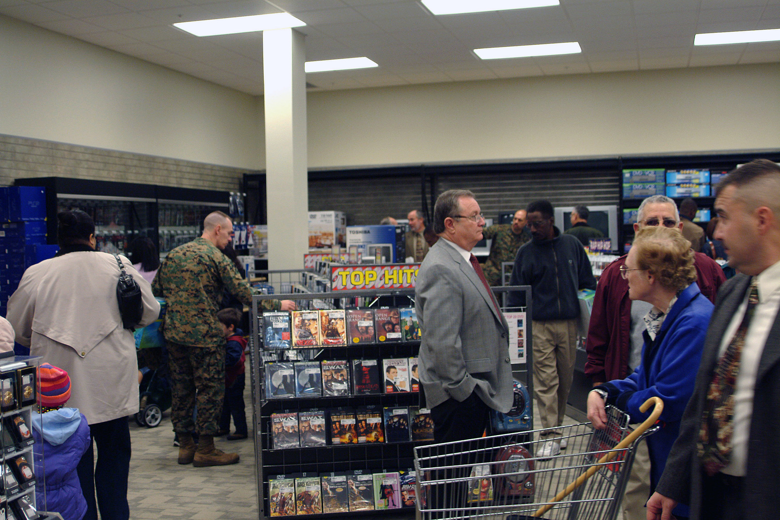 shopper brose though and examine the items on display inside the electronics department at the newly shopper brose though and examine the items on display inside the electronics department at the newly