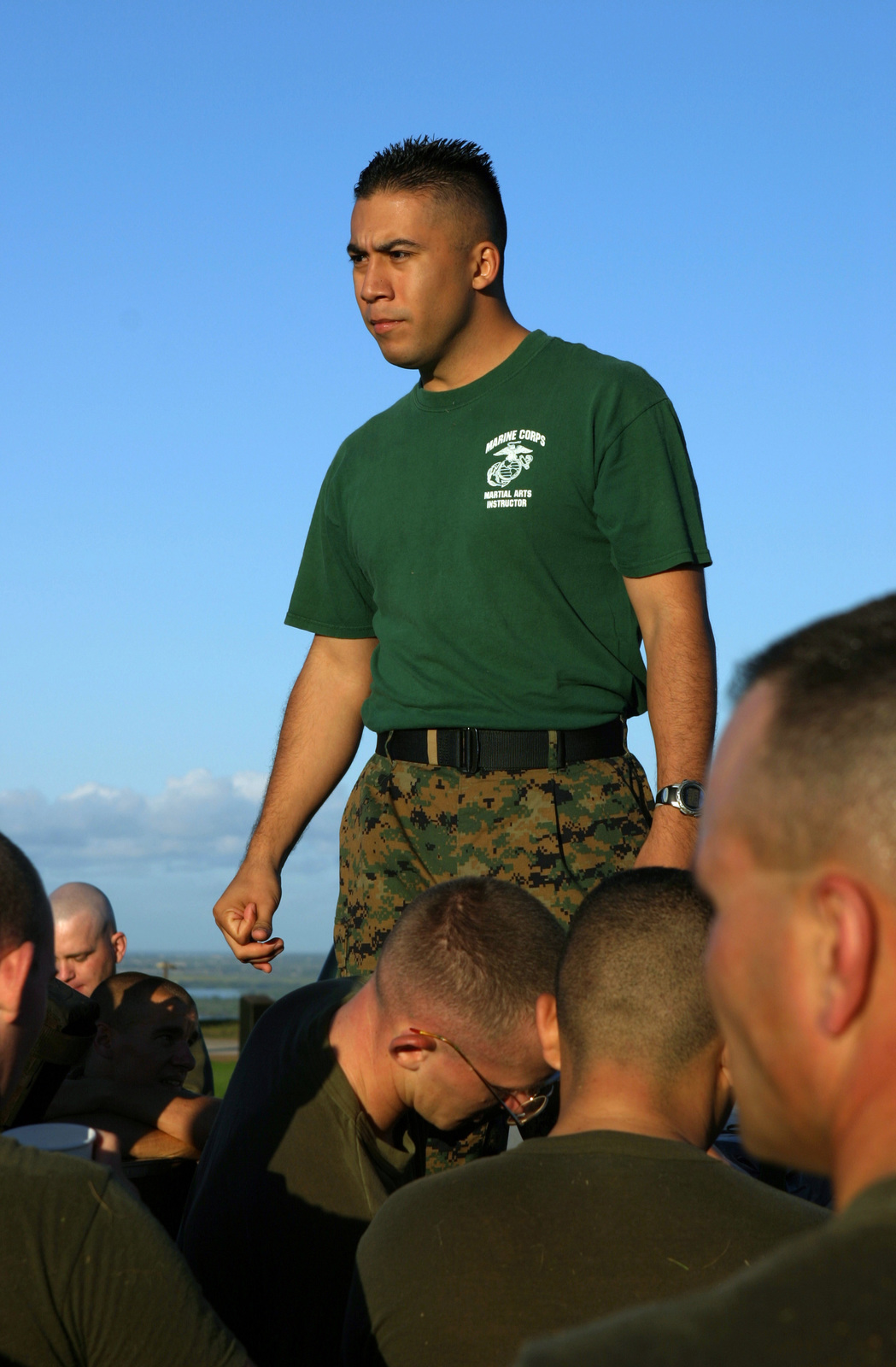 US Marine Corps (USMC) STAFF Sergeant (SSGT) Ramirez (center