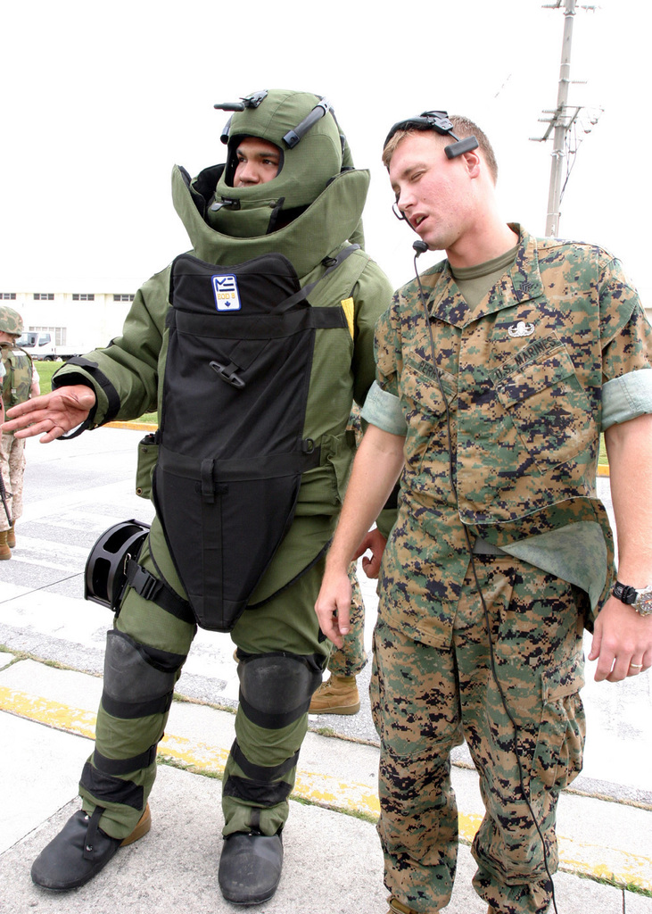 US Marine Corps (USMC) Sergeant (SGT) Lauro Samaniego (left, wearing an ...