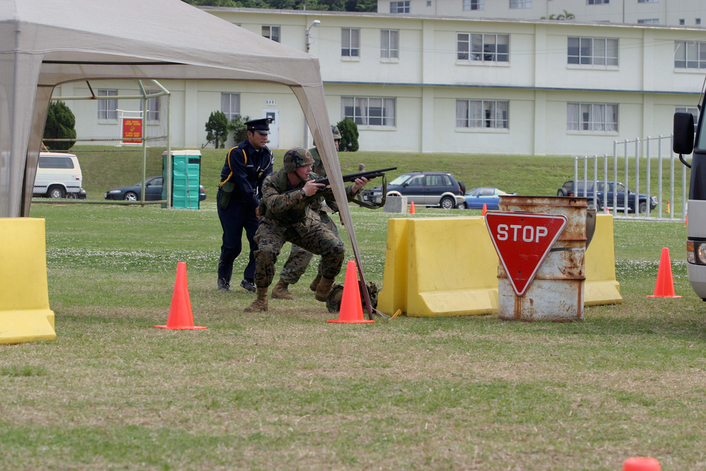 Two Us Marine Corps (usmc) Provost Marshal Office (pmo) Marines And A 