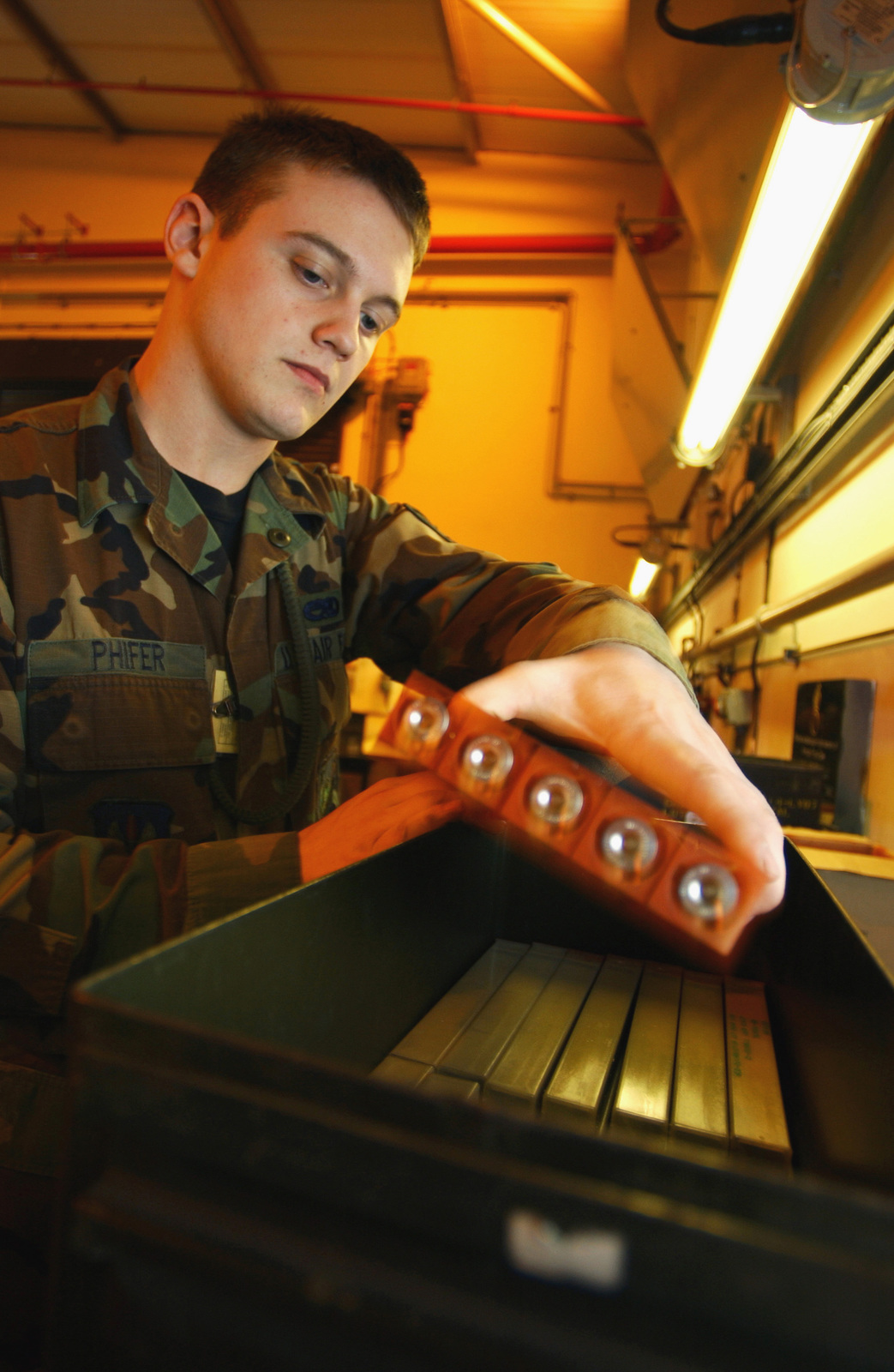 Us Air Force (Usaf) Airman First Class (A1c) Chris Phifer, Conventional  Maintenance Crewmember, 48Th Munitions Squadron (Muns), Raf Lakenheath,  United Kingdom (Uk), Complete The Process Of Building Chaff. Chaff Is  Composed Of