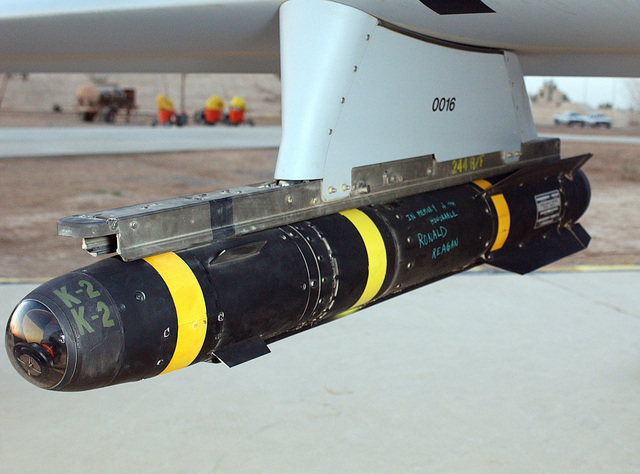 An AGM-114 Hellfire missile hung on the rail of an US Air Force (USAF ...