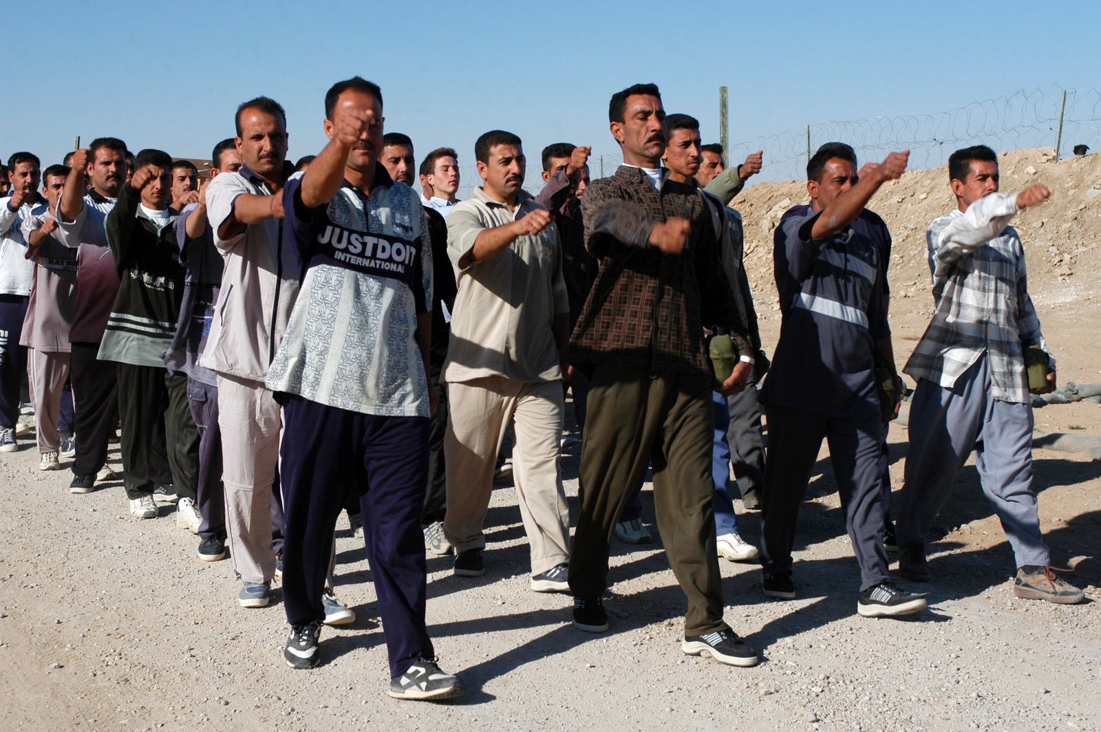 A group of 60th Iraqi Civil Defense Corps (ICDC) Brigade (BDE) recruits ...