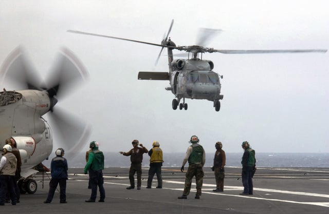 Us Navy Usn Sailors Watch A Usn Sh 60f Seahawk Helicopter Assigned To