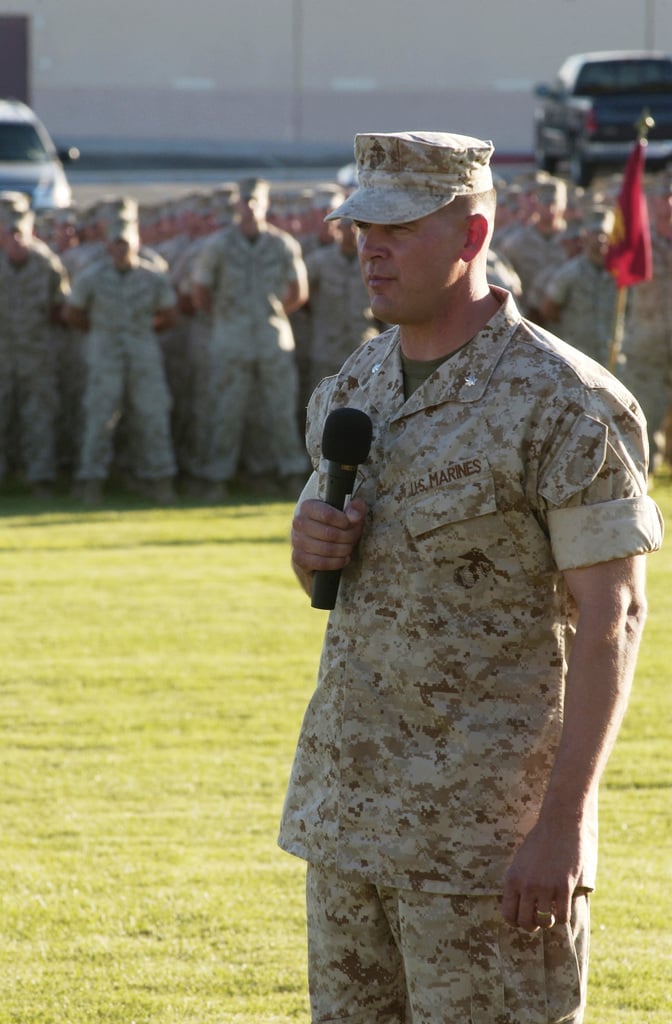 The outgoing Battalion (BN) Commander (CDR), US Marine Corps (USMC ...