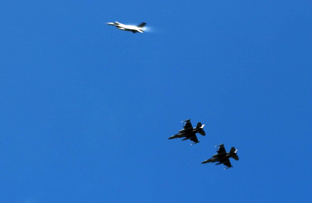 Three US Air Force (USAF) F-16 Fighting Falcons, 23rd Fighter Squadron ...