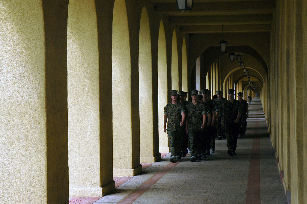 LAKES, Ill. (Nov. 14, 2017) Recruits march down a street at Recruit  Training Command (RTC) while wearing the Navy Working Uniform (NWU) Type  III uniforms. The new camouflage uniforms started being issued