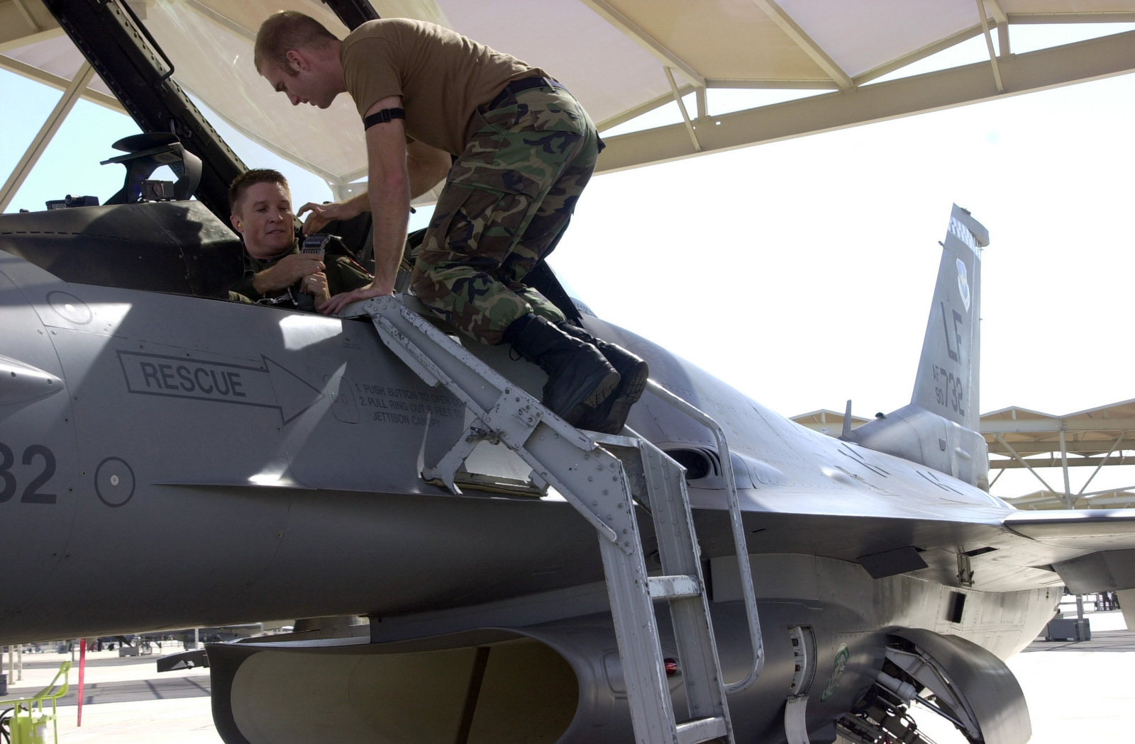 US Air Force (USAF) Major (MAJ) Tom Stewart (left), a USAF ...