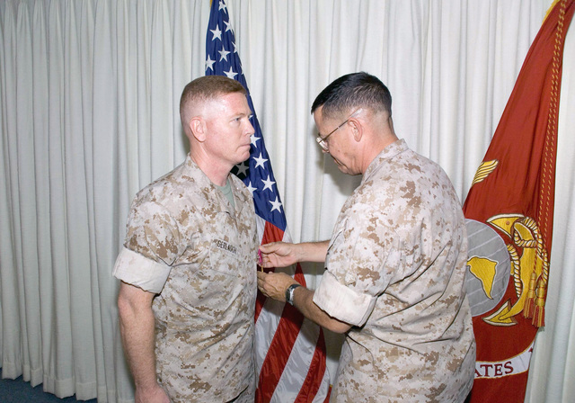 US Marine Corps (USMC) Colonel (COL) Larry Brown (right), Assistant ...