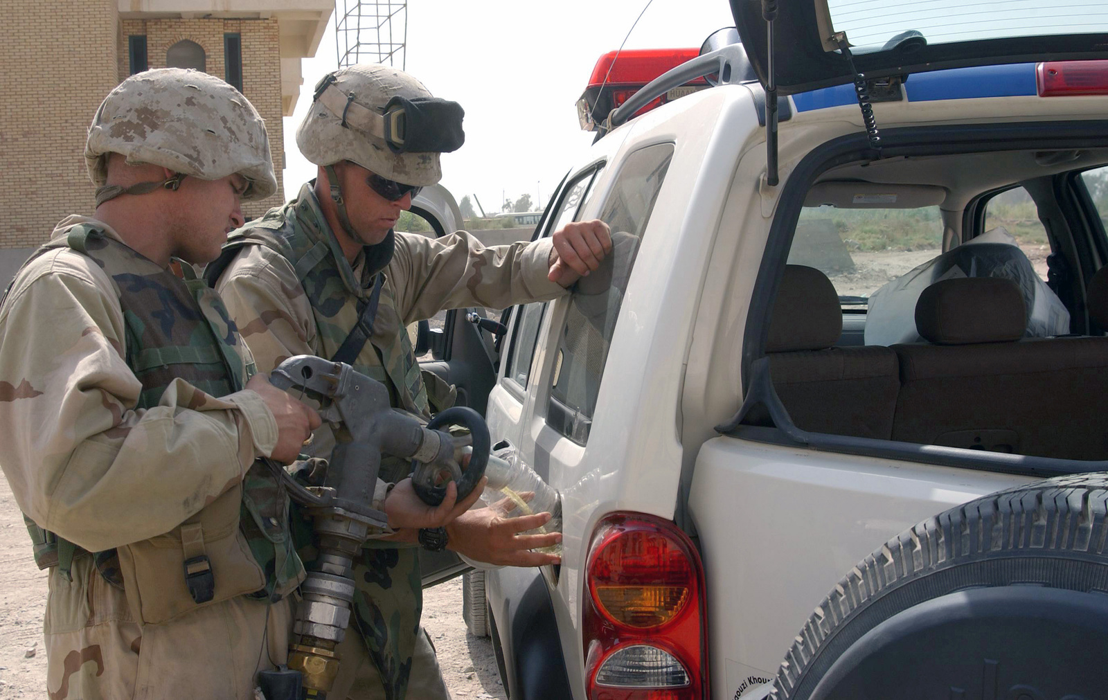 US Marine Corps (USMC) Marines assigned to Service Support Group One ...