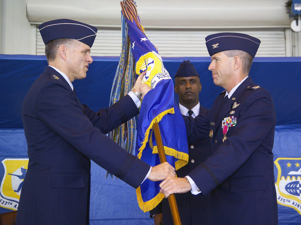 U.S. Air Force Brig. GEN. Brooks Bash (right) relinquishes his command ...