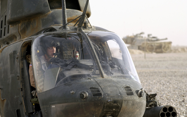 A U.S. Army OH-58D Kiowa Warrior Pilot From 1-4, Cavalry, 1ST Infantry ...