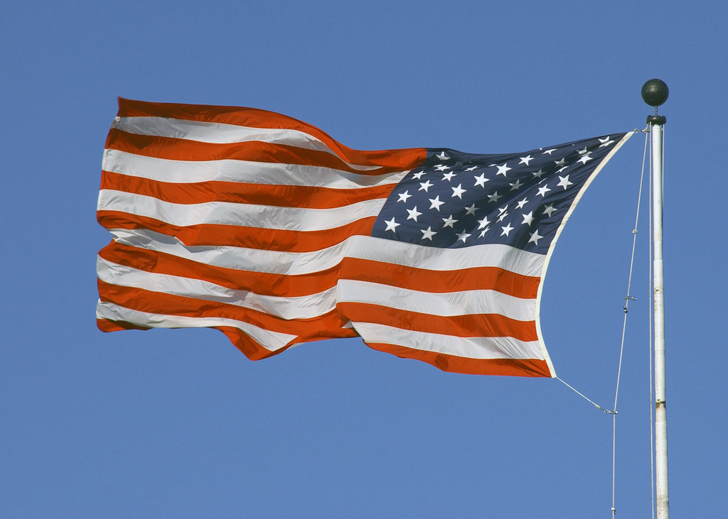 File:A giant American flag is unfurled at Wrigley Field before World Series  Game 3. (30342685410).jpg - Wikimedia Commons