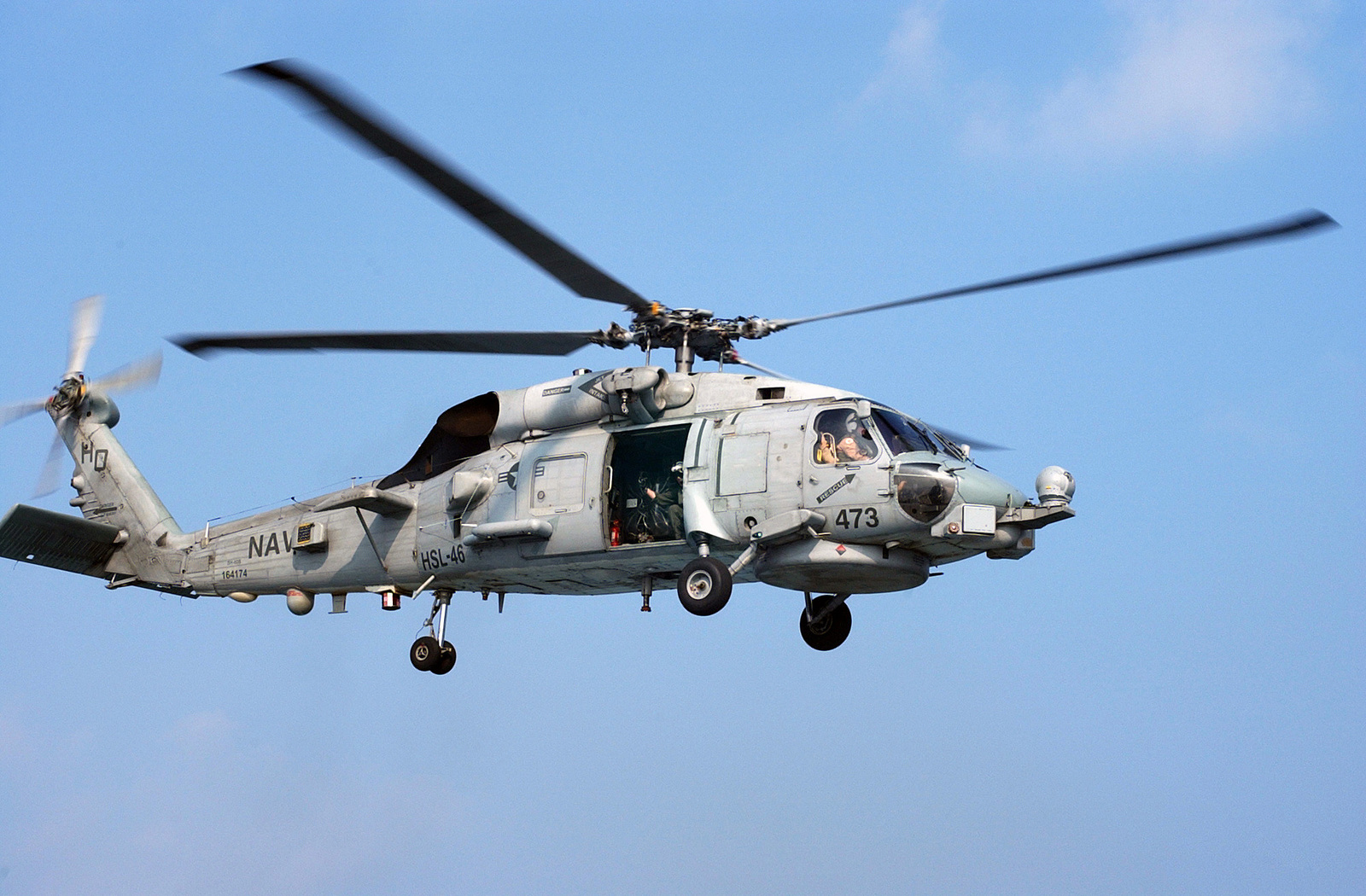 A US Navy (USN) SH-60B Seahawk helicopter, Helicopter Anti-Submarine ...