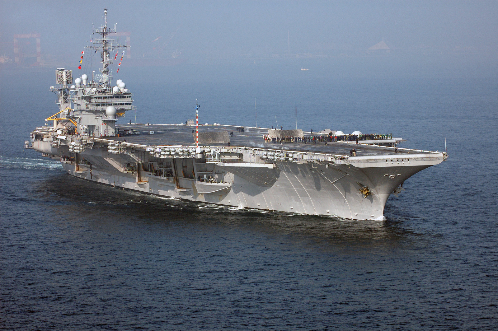 Starboard bow view showing the US Navy (USN) Aircraft Carrier, USS ...