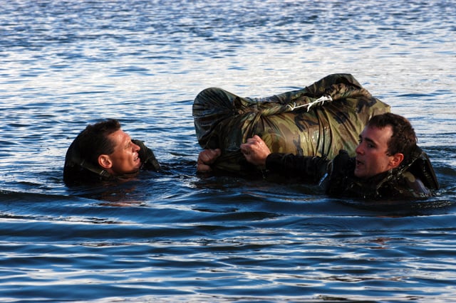 US Army (USA) Sergeant (SGT) Timothy Merrill and STAFF Sergeant (SSG ...