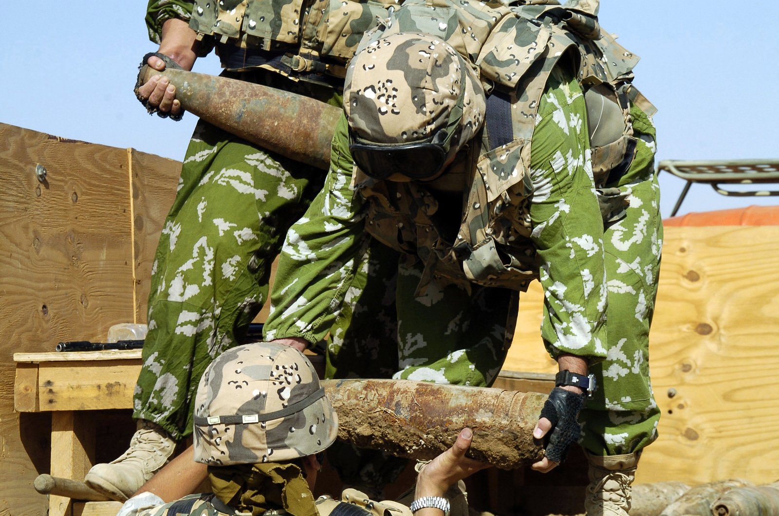 Kazakhstanian E.O.D. (Explosive Ordance Detachment) Soldiers collect ...