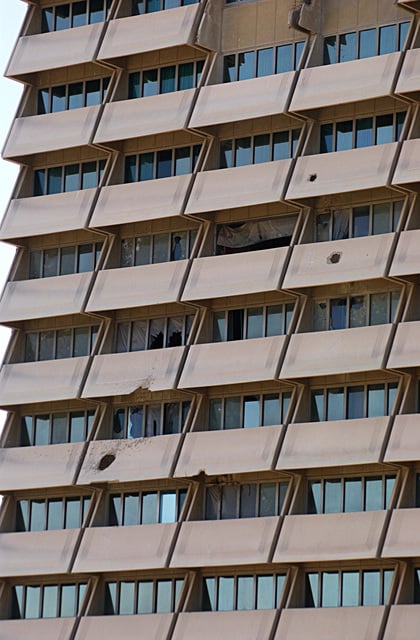 A view showing damage caused by insurgent-launched mortar attacks at ...