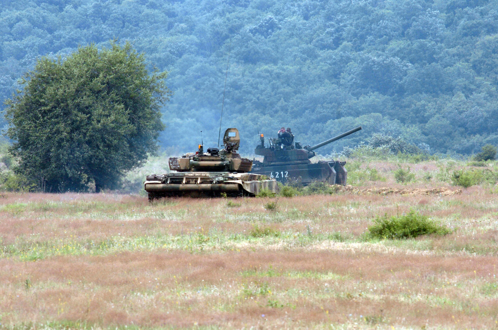 U.S. Army T-72 Main Battle Tank moves in after the attack on the OPFOR ...