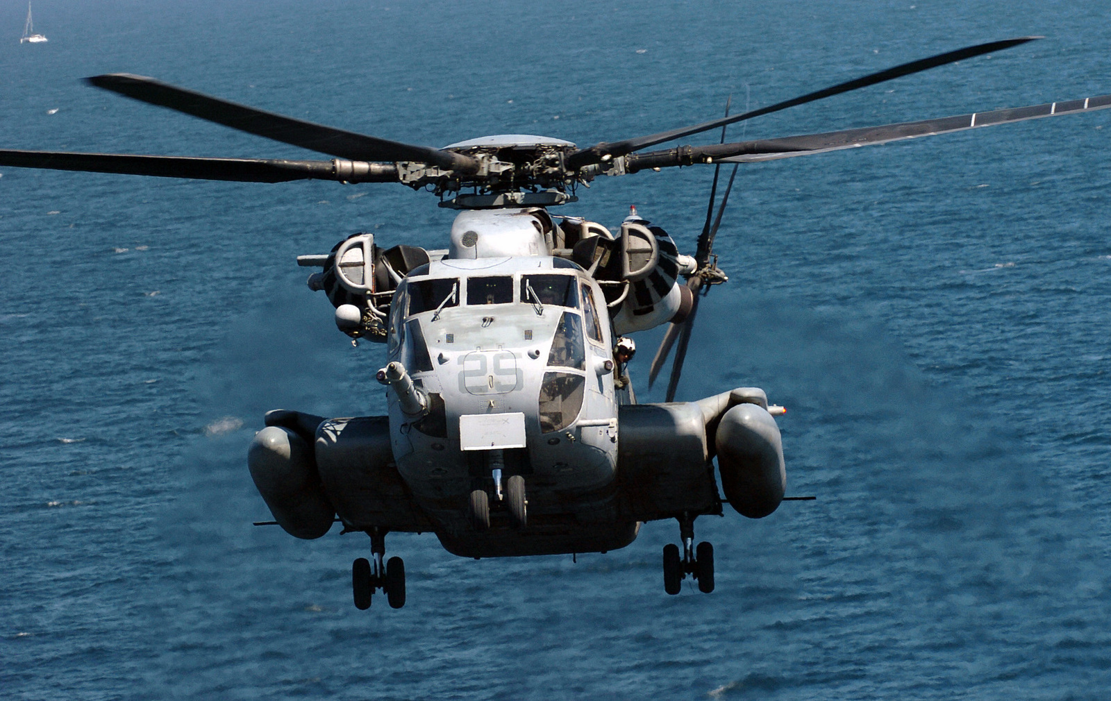 A US Marine Corps (USMC) CH-53E Super Stallion helicopter prepares to ...