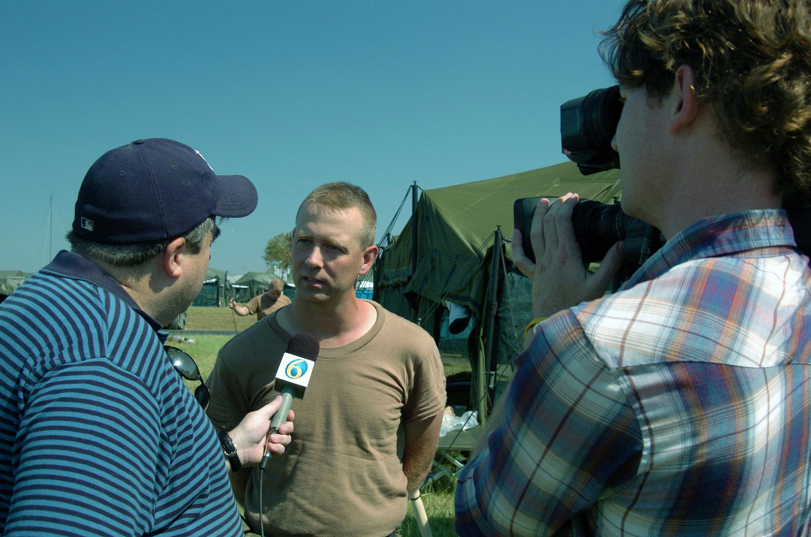 Michigan Army National Guard (MIARNG) Sergeant (SGT) Thomas Wright with ...