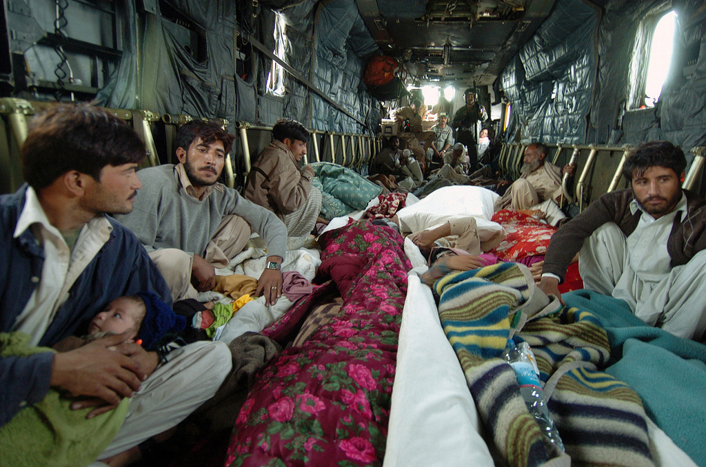 Injured Pakistanis are transported to medical help aboard a US Navy ...