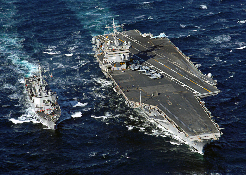 An Aerial View Showing The Us Navy (usn) Arleigh Burke Class (flight Ii 