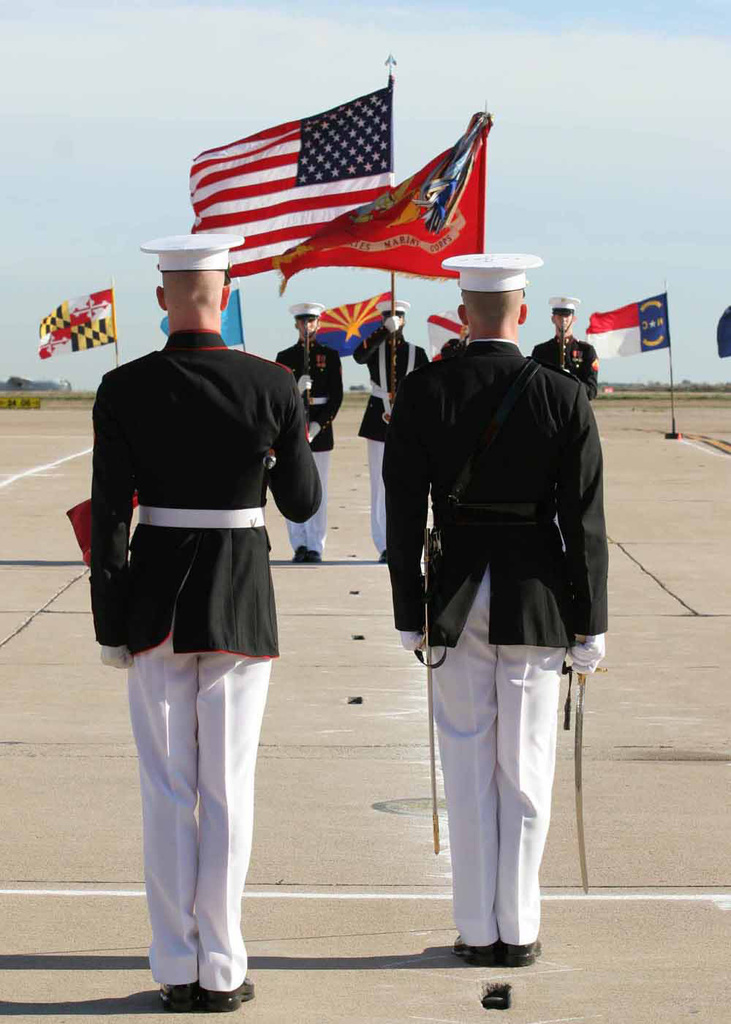 https://cdn10.picryl.com/photo/2006/03/06/the-guide-and-platoon-commander-of-the-silent-drill-team-stand-center-line-714dd1-1024.jpg