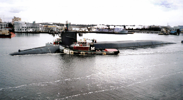 The Us Navy Usn Ohio Class Guided Missile Submarine Uss Florida Ssgn 728 Is Nudged Along By 5028