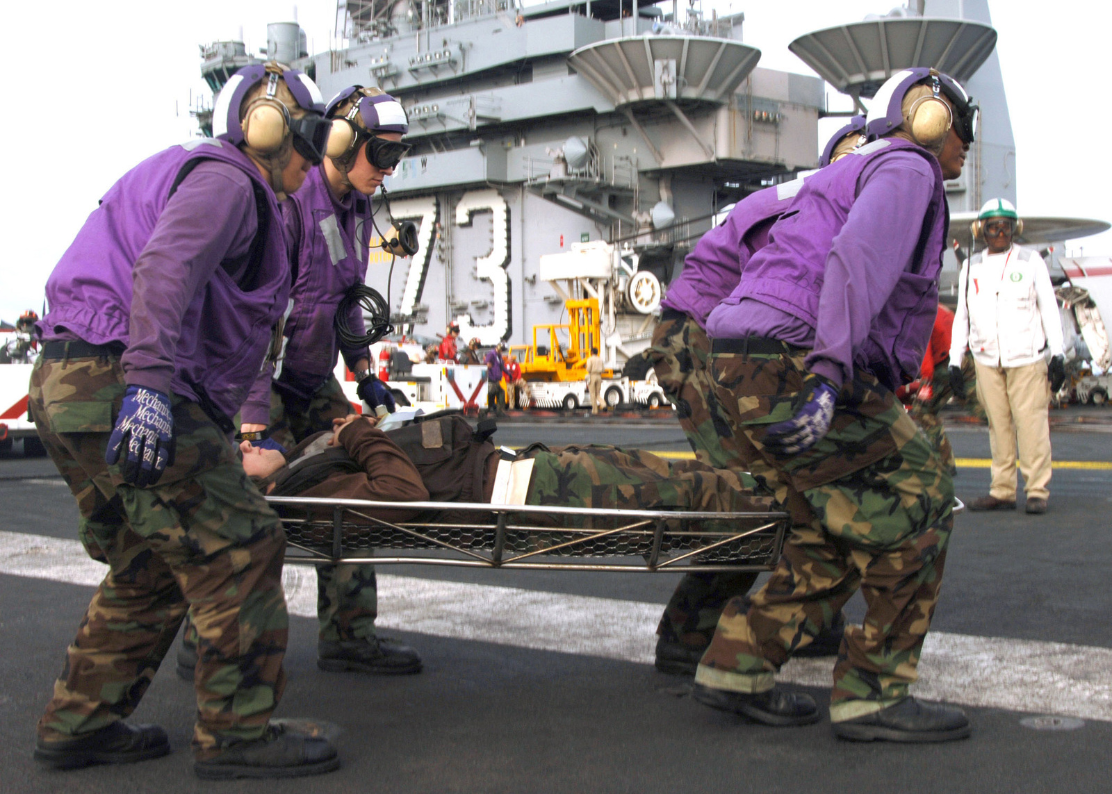 us-navy-usn-purple-shirt-aviation-fuel-crew-members-stationed-aboard-the-usn-0e83c3-1600.jpg