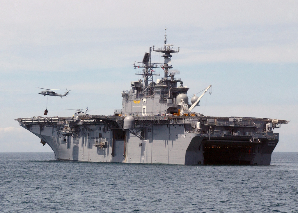 A port side stern view of the US Navy (USN) Wasp Class Amphibious ...