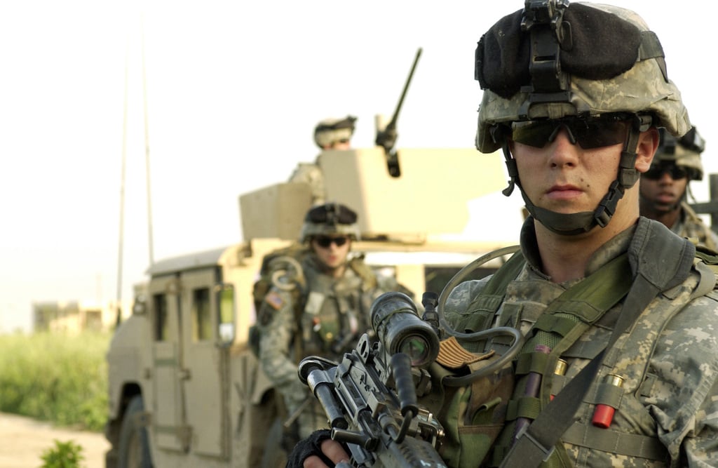 US Army (USA) Private First Class (PFC) Joe Brown (right), Delta ...