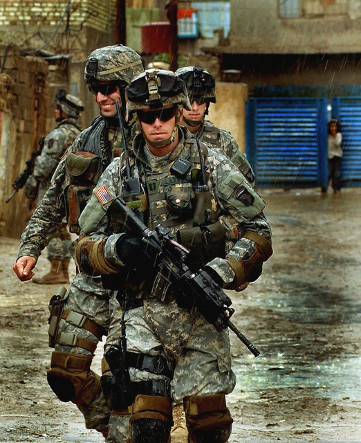 US Army (USA) Captain (CPT) Douglas Laxson (front), Commanding Officer ...