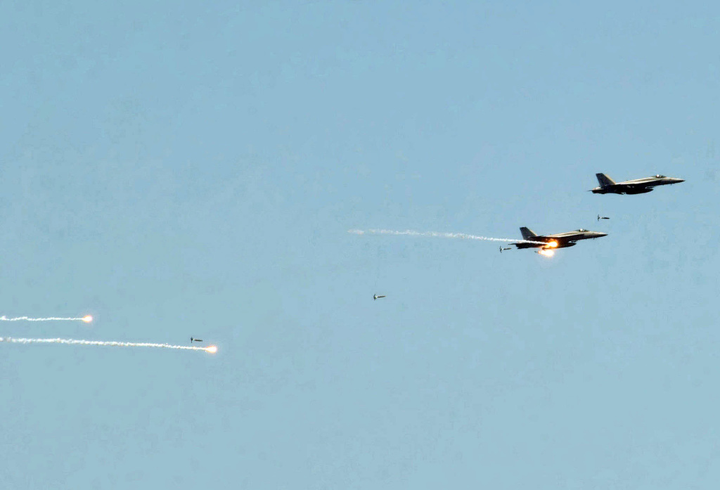 A group of US Navy (USN) F/A-18E Super Hornets from the Strike Fighter ...